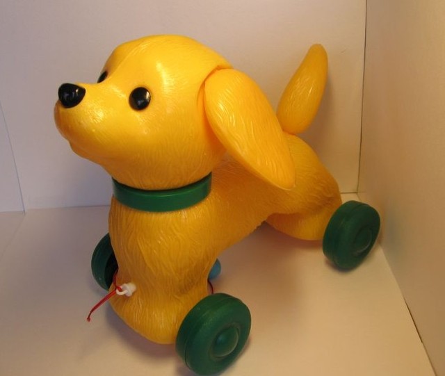 Игрушка для детей собака на поводке.