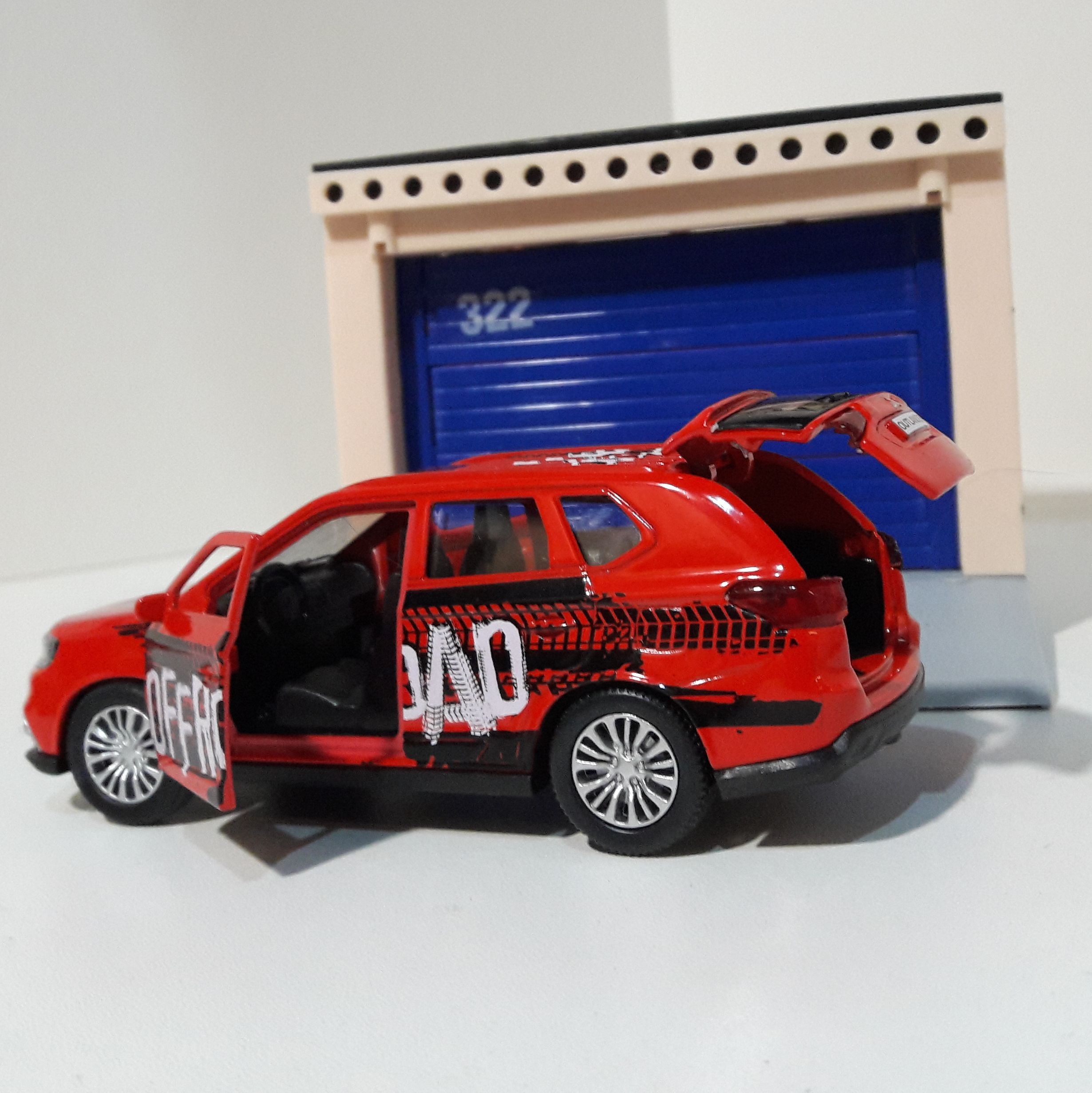 Игрушечный набор гараж с машинкой Renault Duster