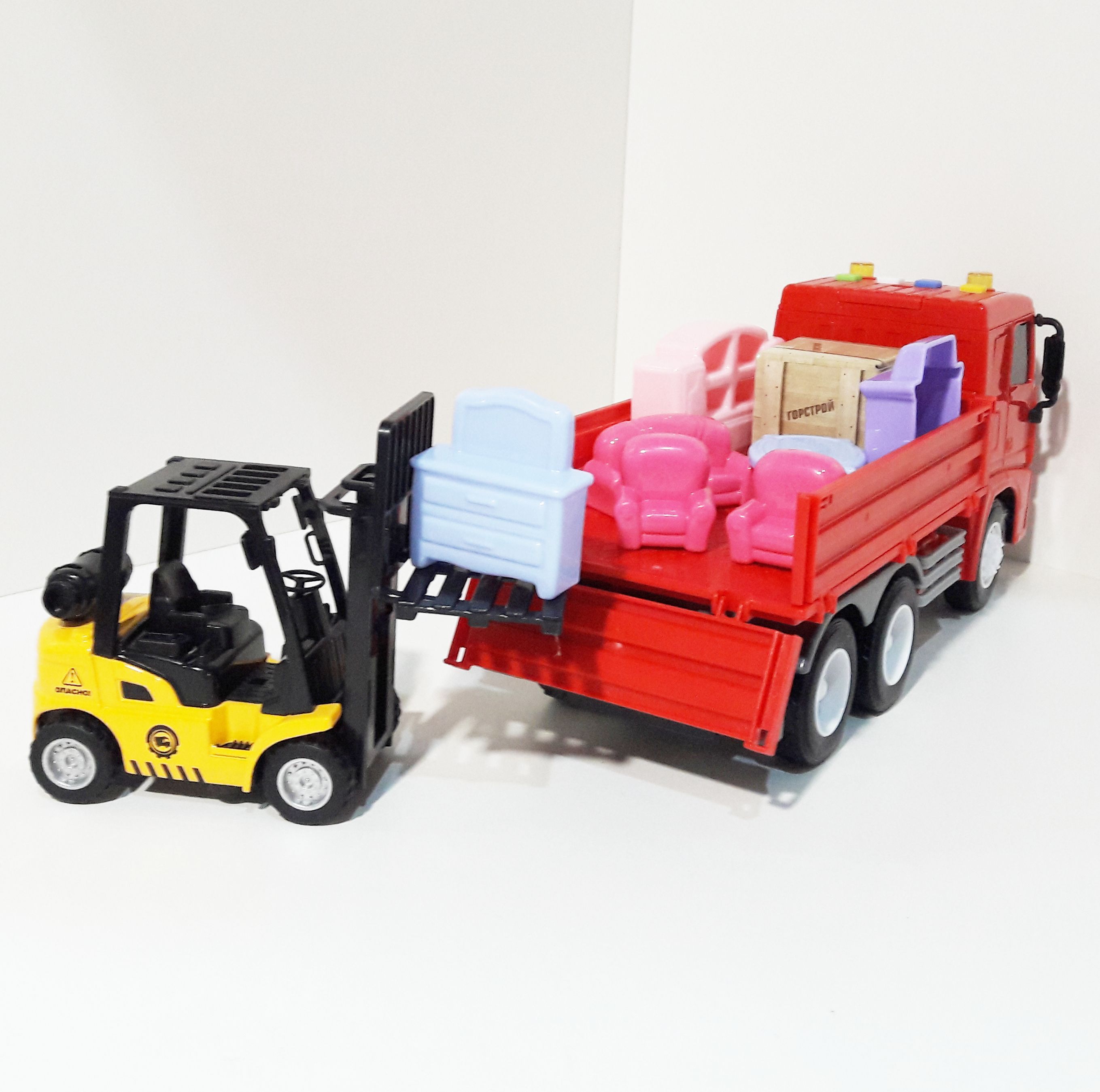Машинка для перевозки - бортовой грузовик МАЗ - 25,7 см - автопогрузчик инерция, свет-звук- мебель 7 предметов