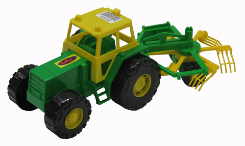 Детский пластмассовый трактор с сеноворошилкой. Купить пластмассовый трактор.