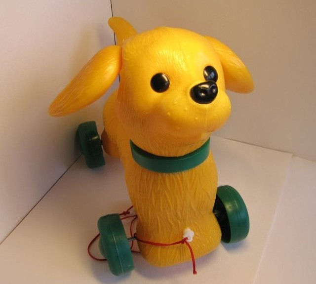 Игрушка для детей собака на поводке.