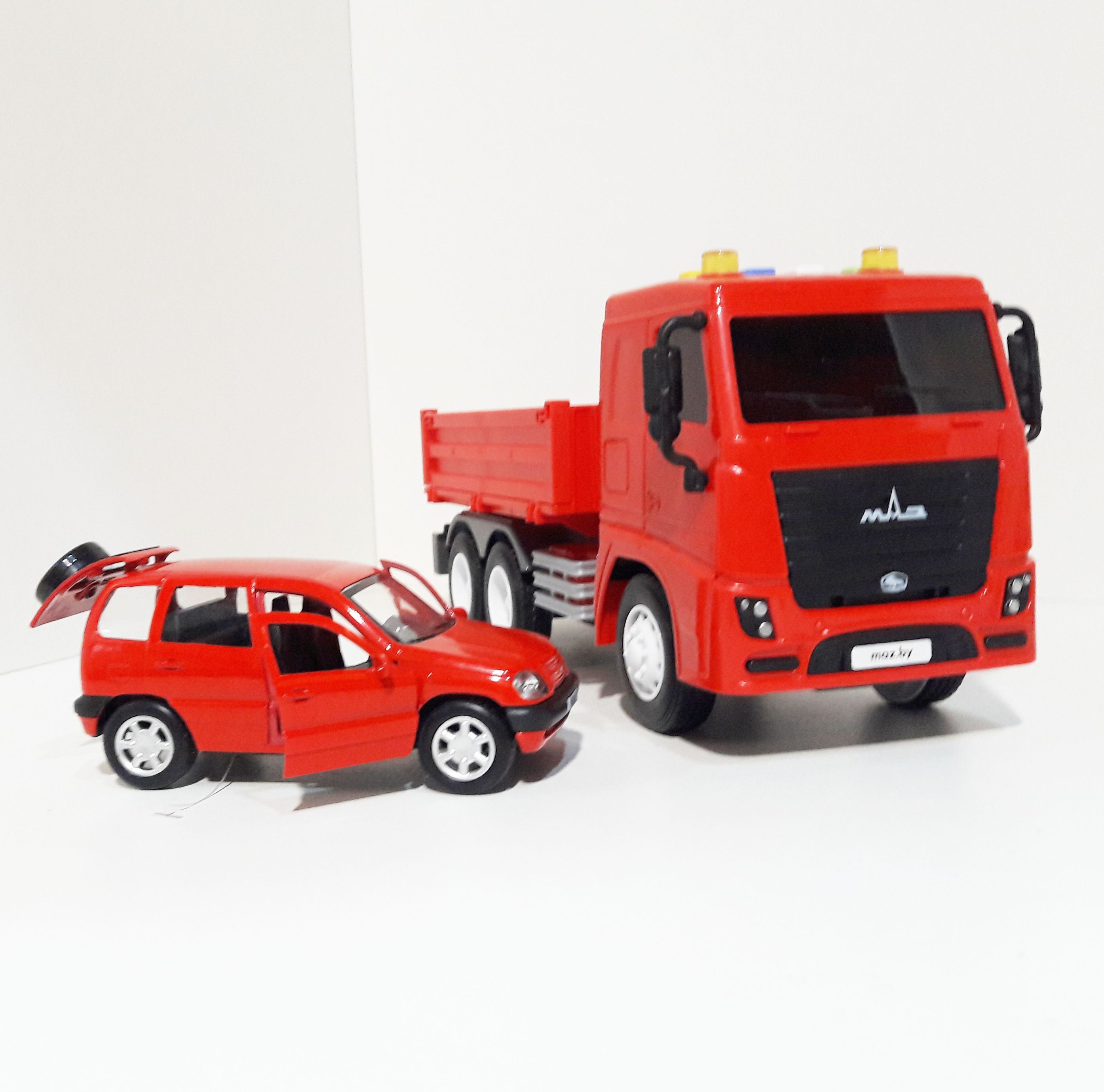 Машинка бортовой грузовик МАЗ - 25,7 см инерция, свет-звук- металлическая машинка