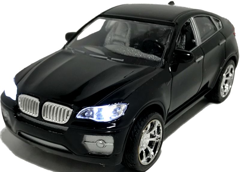 При нажатии на корпус машинки начинают загораться фары и звучать двигатель. mashinka-igrushechnaya-bmw-x6-04.jpg