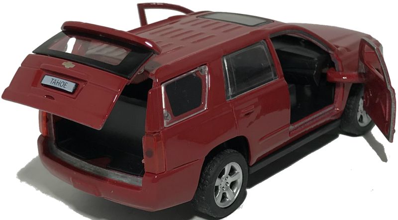 У машинки Chevrolet Tahoe открываются две передние двери и задняя дверь багажника. igrushechnaya-mashinka-chevrolet-tahoe-krasnaya-05.jpg